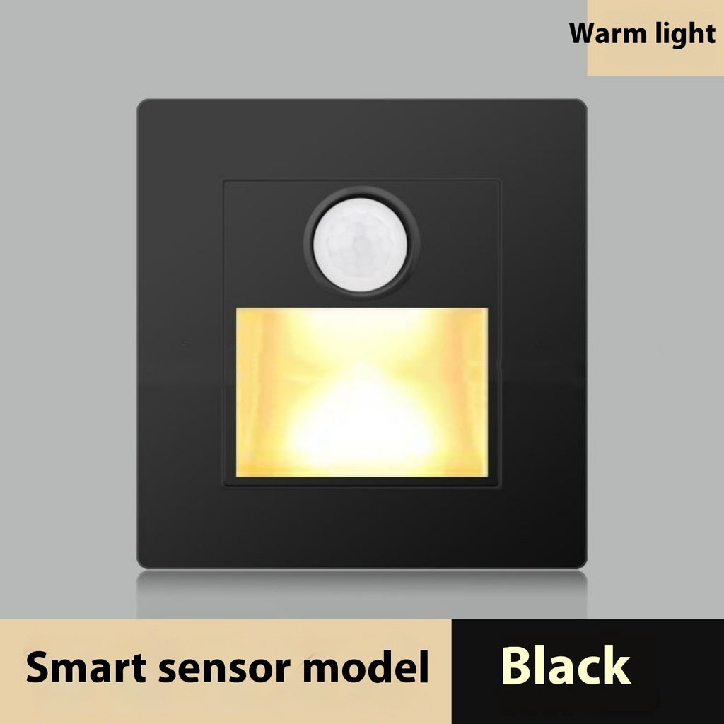 Black smart sensor light with warm light on a gray background