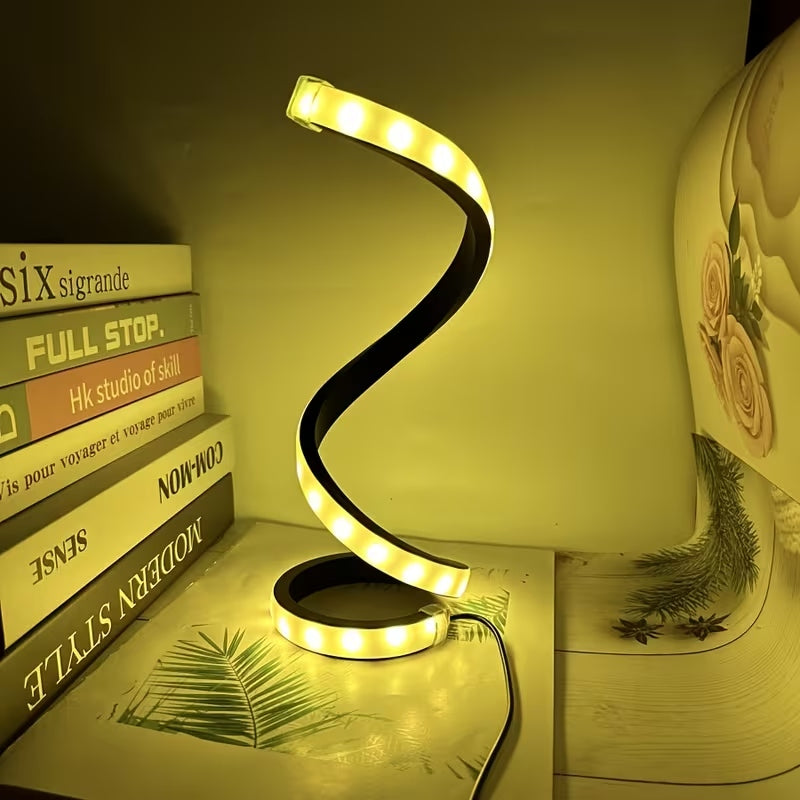 Spiral LED strip light on a shelf with books and decorative items