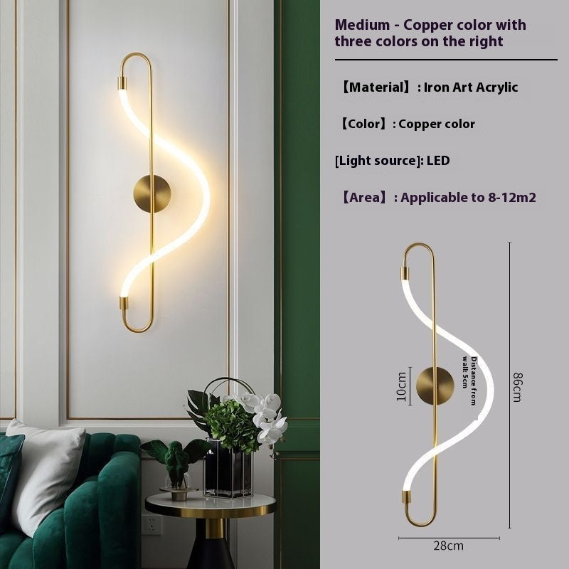 Wall-mounted light fixture with copper finish in a room setting
