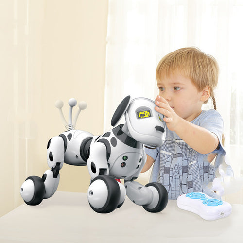 Child playing with a toy dog on a light-colored surface