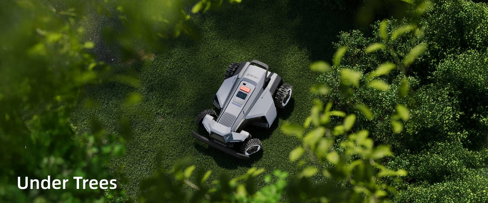 Robotic lawn mower navigating through grass and trees