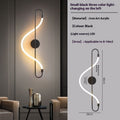 S-shaped wall-mounted LED light fixture in black iron art acrylic, shown lit in a modern living room setting on the left, with a technical dimension diagram and product specifications on the right.