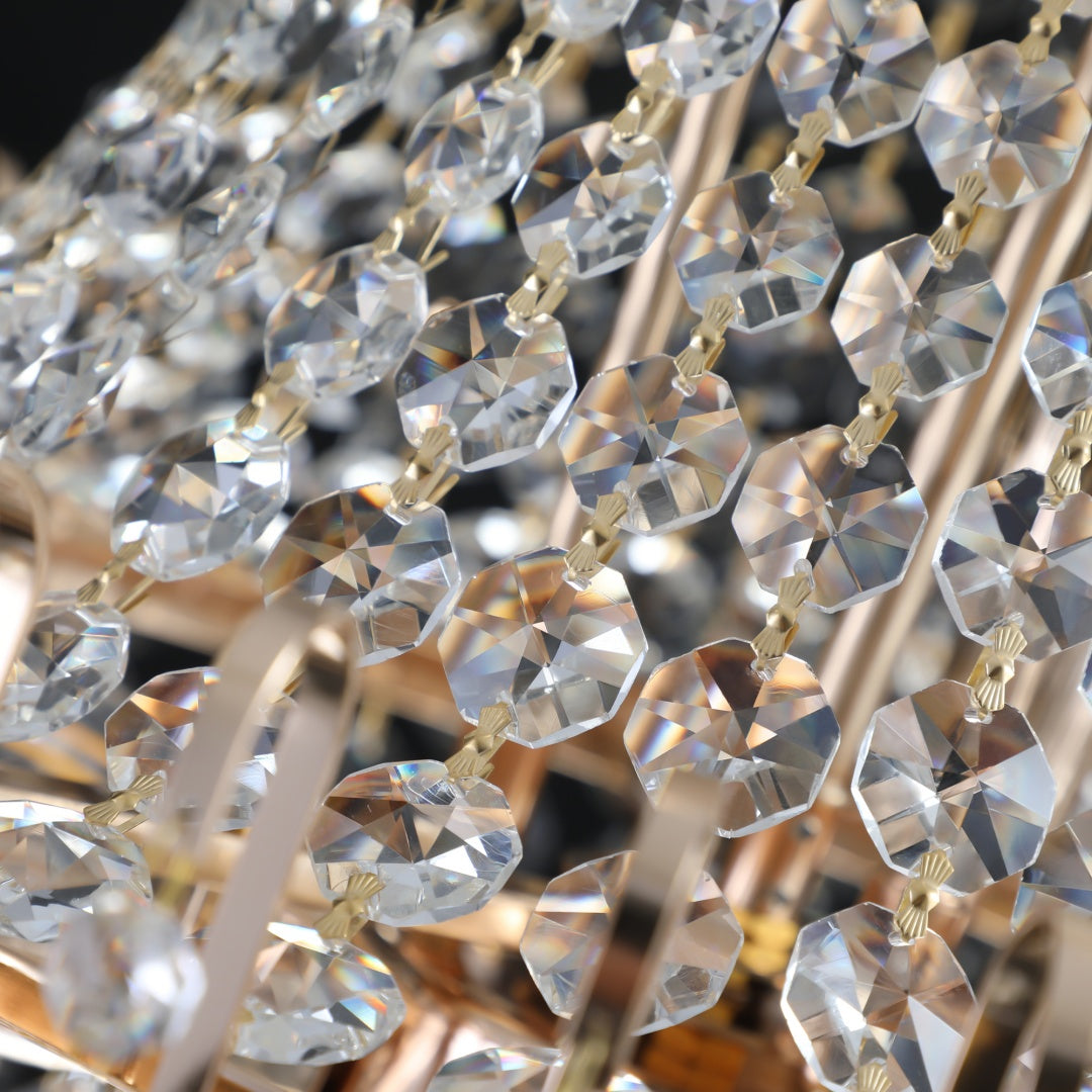 Close-up of a decorative chandelier with crystal-like beads and gold accents.