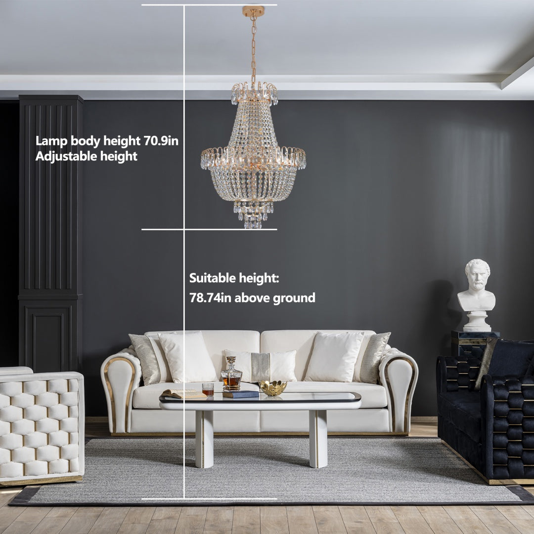 Living room with a chandelier, sofa, and decorative items on a gray wall background.