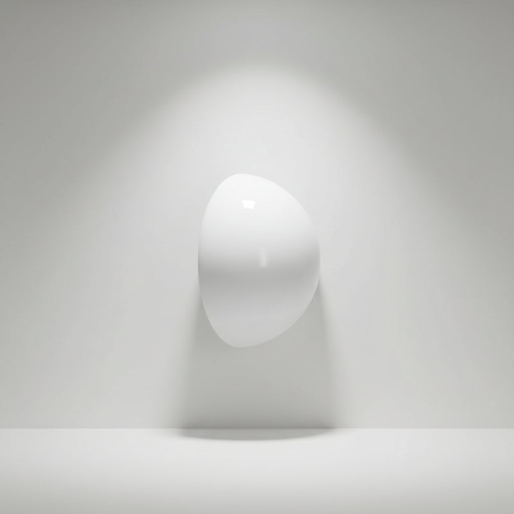 A single white, dome-shaped glossy accessory, possibly a small cap, cover, or decorative piece, shown against a solid white background.